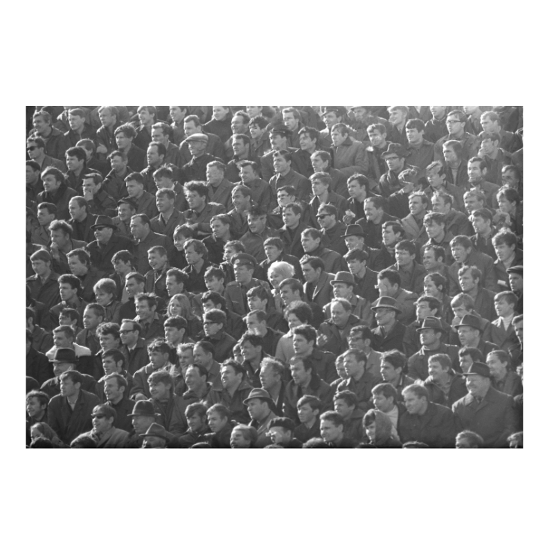 100 men and one woman in a stadium, 1973