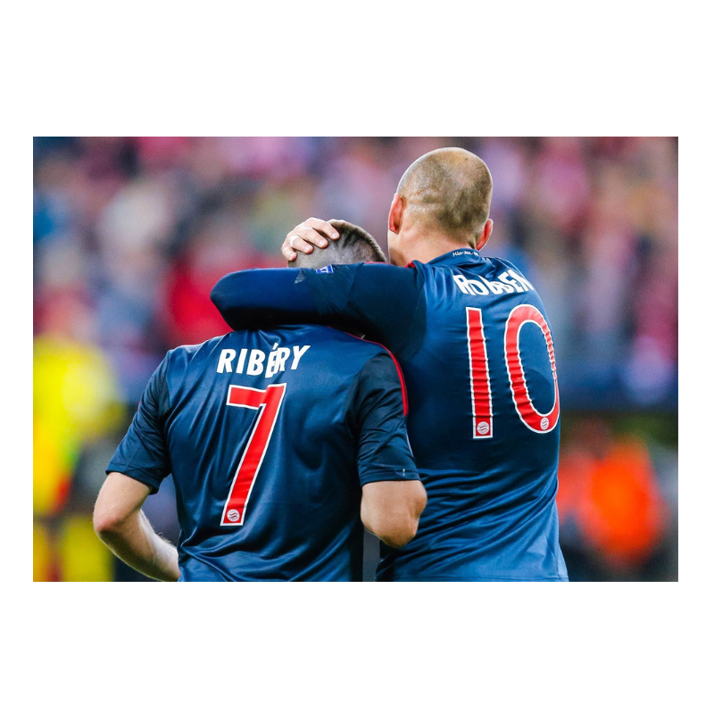 Ribéry e Robben festeggiano insieme un gol, 2013
