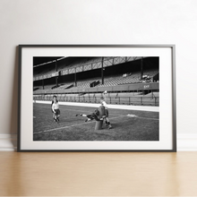 Load image into Gallery viewer, 100 men and one woman in a stadium, 1973