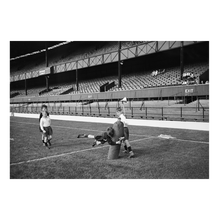 Load image into Gallery viewer, 100 men and one woman in a stadium, 1973