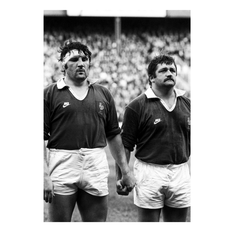 100 men and one woman in a stadium, 1973