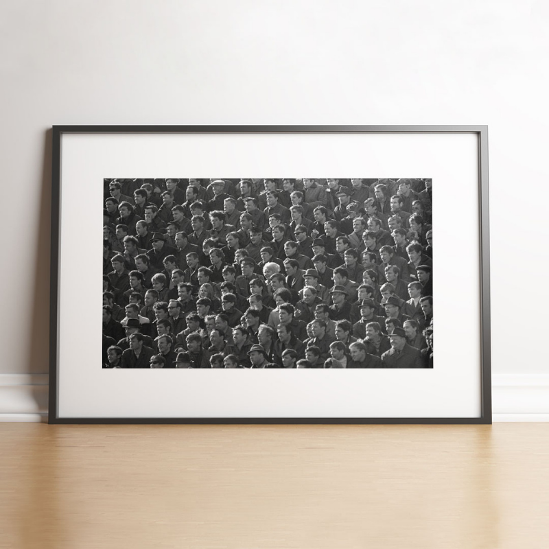 100 men and one woman in a stadium, 1973