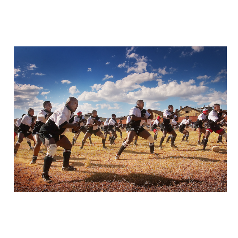 100 men and one woman in a stadium, 1973
