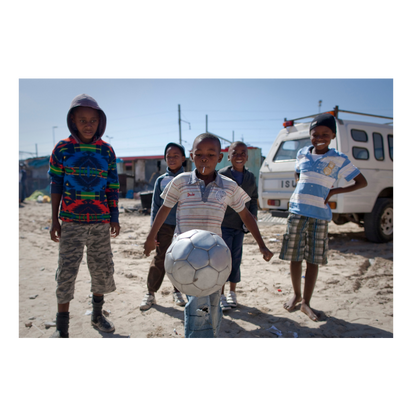 Enfants sud-africains jouant au football, 2010