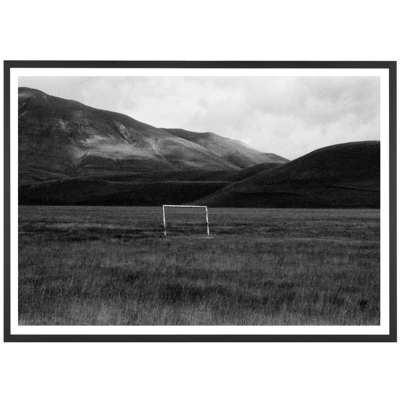 A goal cage in the middle of the Italian mountains, 2005