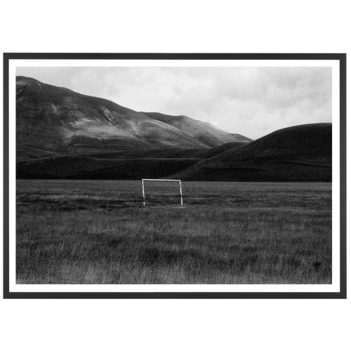 A goal cage in the middle of the Italian mountains, 2005