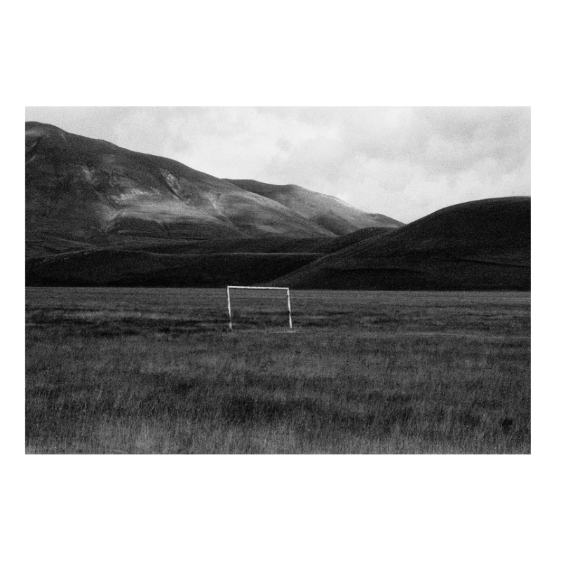A goal cage in the middle of the Italian mountains, 2005
