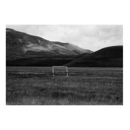 A goal cage in the middle of the Italian mountains, 2005