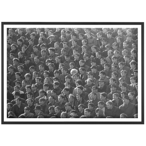 100 men and one woman in a stadium, 1973