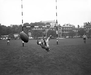 Rugby pass in mid-flight, 1966
